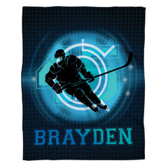 Ice hockey skater blanket showing athlete silhouette surrounded by glowing cyan radar rings.