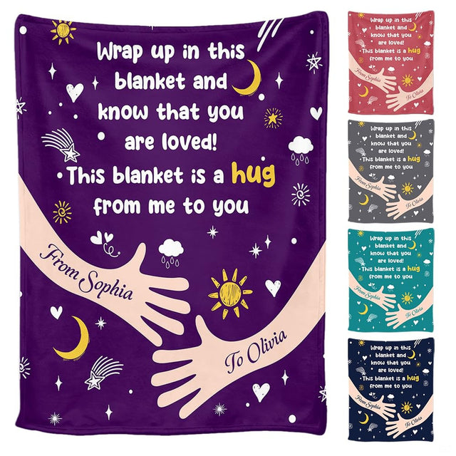 Close-up view of celestial artwork displaying radiant suns, crescent moons, and stars on rich violet bedding.