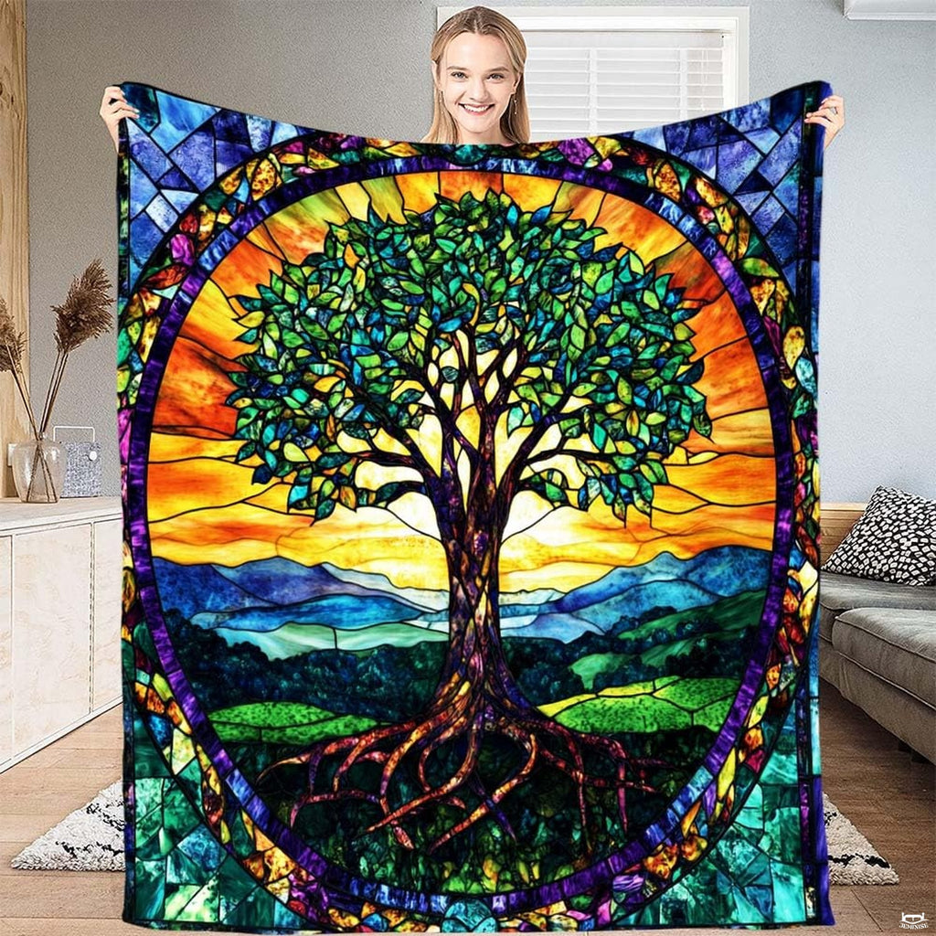 Full view of throw blanket displaying stained glass Tree of Life with golden sunrise and cobalt mosaic border.