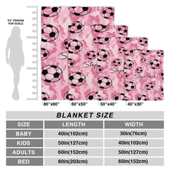 Living room styling with pink camouflage soccer graphic blanket