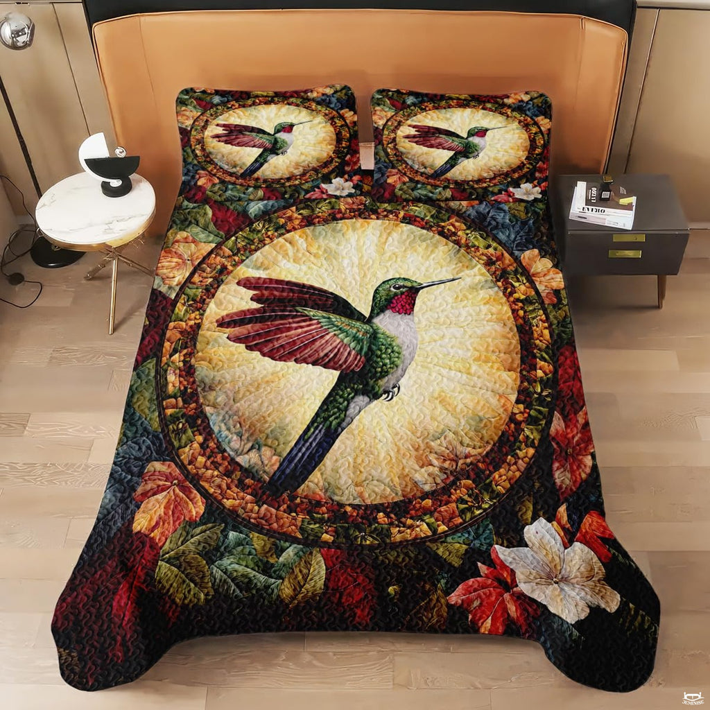 Overhead view of ruby throat hummingbird bedding with matching pillow artwork