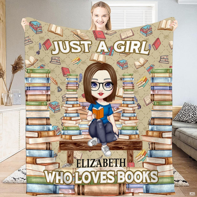 Chibi thematic accent reading on bench on book themed bedding set in styled bedroom setting.