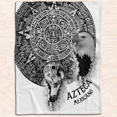 Father and child reading in bed covered by Mexican cultural throw blanket