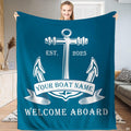 Coastal blue bedding set featuring a crisp white maritime anchor motif on a navy blue background.