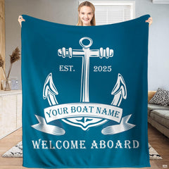 Coastal blue bedding set featuring a crisp white maritime anchor motif on a navy blue background.
