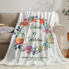 Overhead perspective of watercolor botanical wreath bedding set centered neatly against clean white styling.