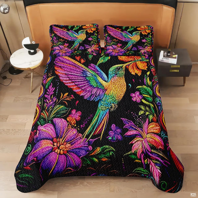 Overhead view of vibrant multicolor hummingbird floral bedding art