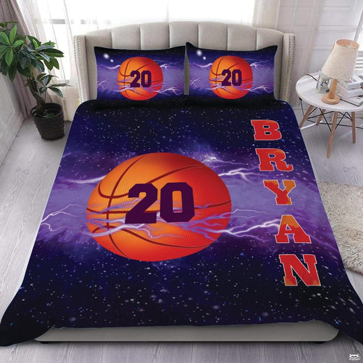 Cosmic basketball galaxy bedding set displaying glowing purple nebulas and electric bolts across dark indigo hues.