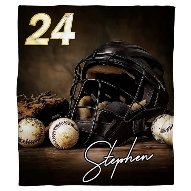 Baseball catcher throw blanket featuring black caged helmet mask, fielding mitt, and balls on wood