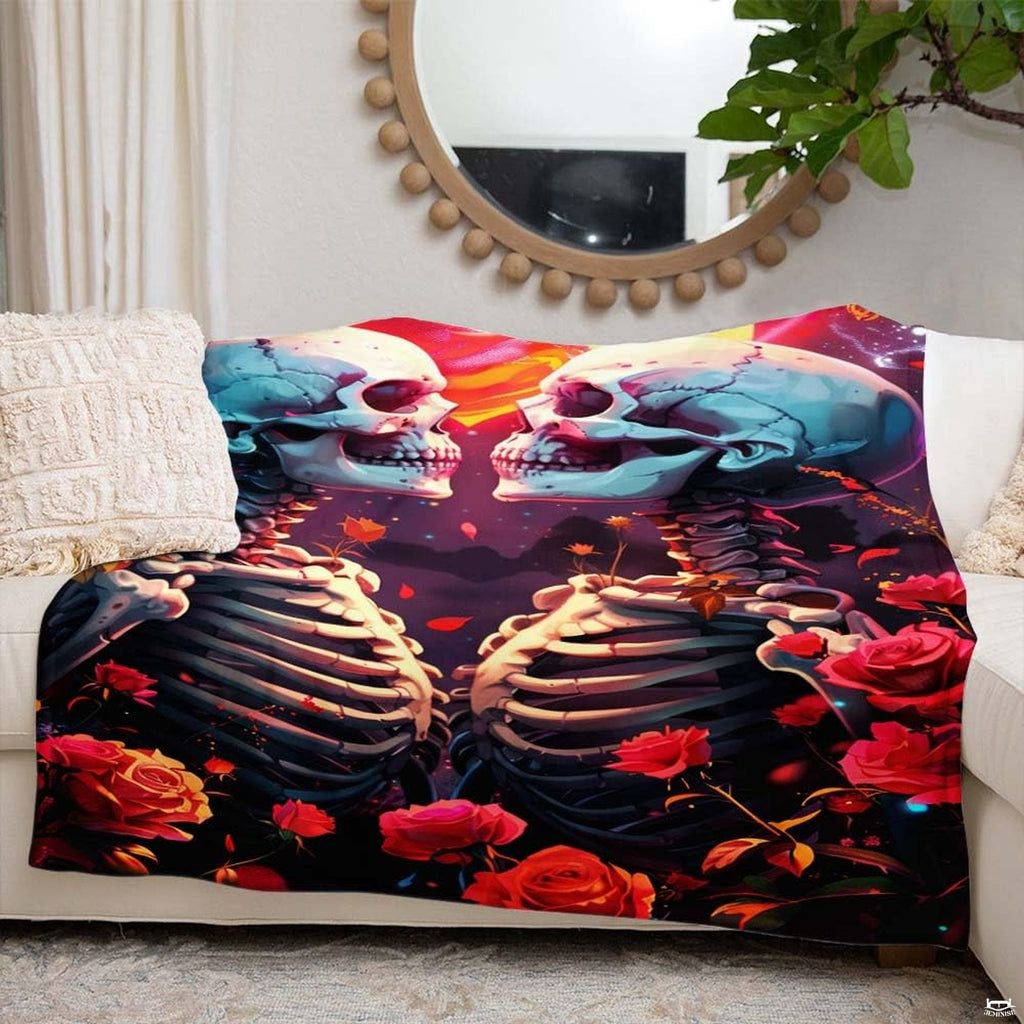 Folded corner view of skeleton throw blanket highlighting glowing heart moon