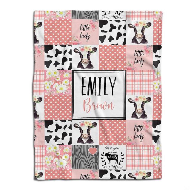 Pink farmhouse calf patchwork throw blanket featuring floral heifers, gingham checks, and cow spots.