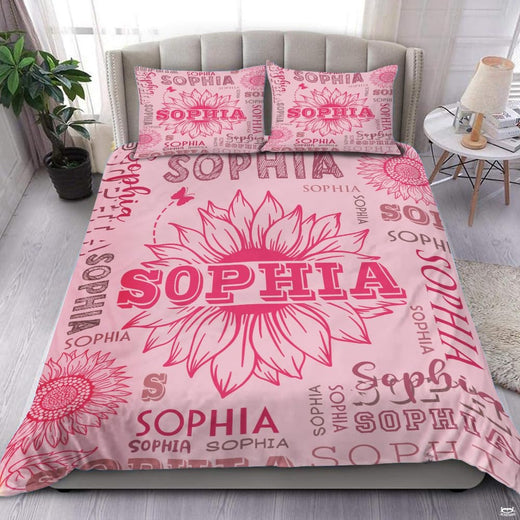 Vivid fuchsia and carnation pink unicorn floral bedding set displayed neatly on a bed in a vibrant bedroom