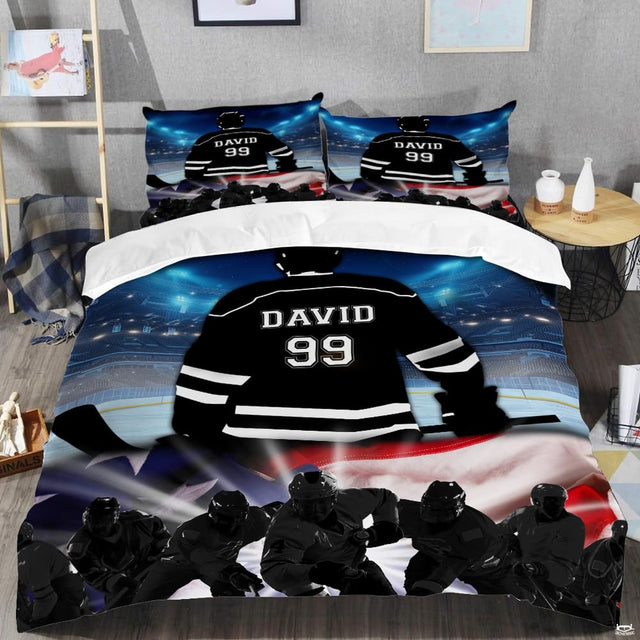 Top-down view of patriotic ice hockey bedding set arranged neatly on a youth bedroom mattress