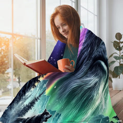 Person reading near window wrapped in vibrant emerald and purple aurora night sky artwork.
