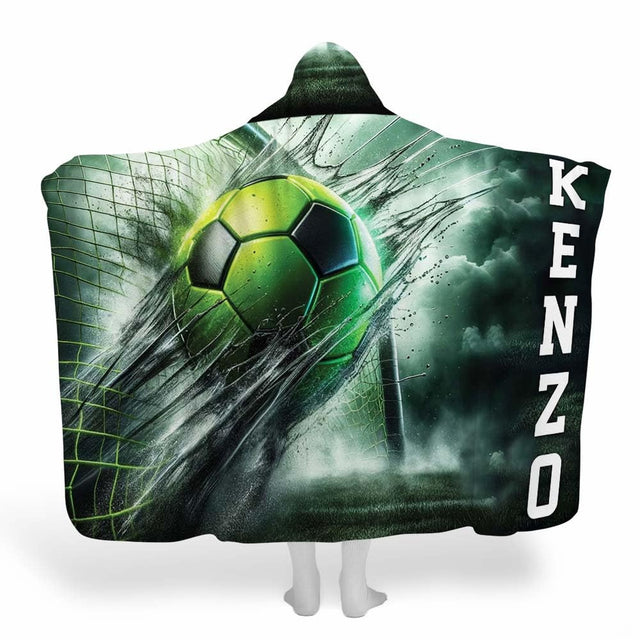 Display showing neon green soccer ball blanket with dynamic goal net strike and water spray artwork