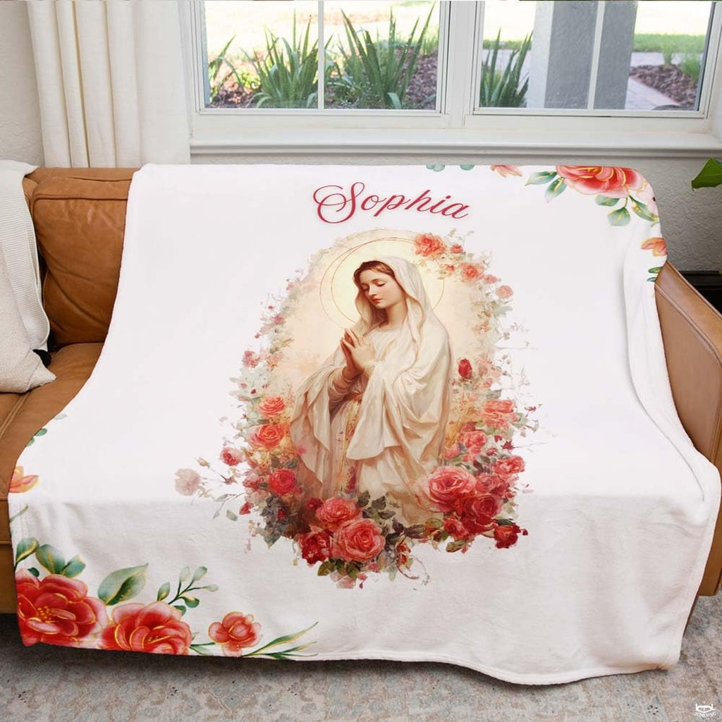 Overhead perspective of watercolor Virgin Mary and botanical rose cluster artwork in serene bedroom setting.
