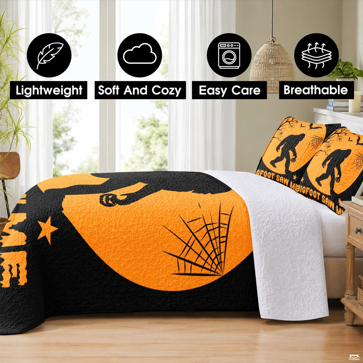 Close view of Halloween bed cover single visual artwork with spooky spiderwebs and eerie bare trees.