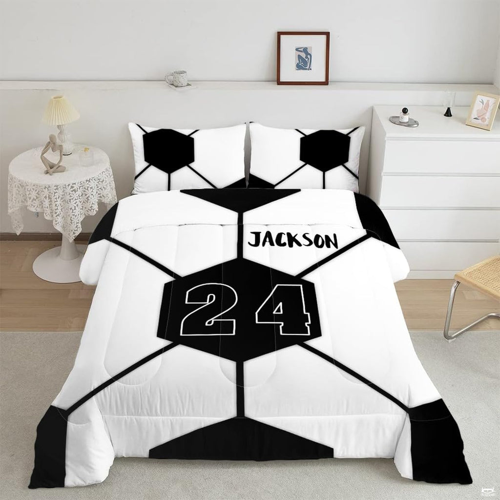 Minimalist geometric soccer bedding displaying oversized black and white hexagonal ball panel artwork