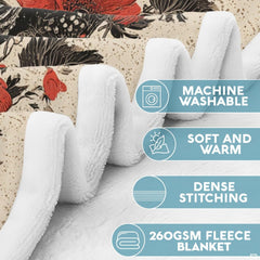 Close-up of gothic floral print featuring entwined skeletons holding an anatomical heart on dark romantic bedding.