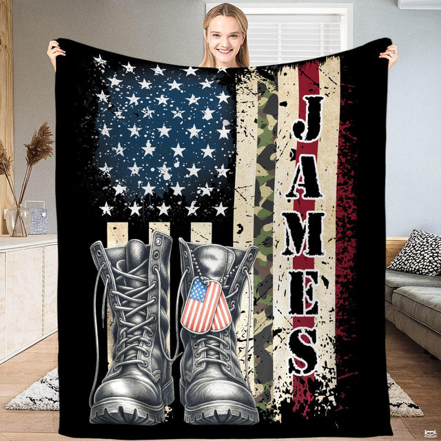 Military combat boots throw blanket featuring an American flag, camouflage stripes, and dog tags on black.