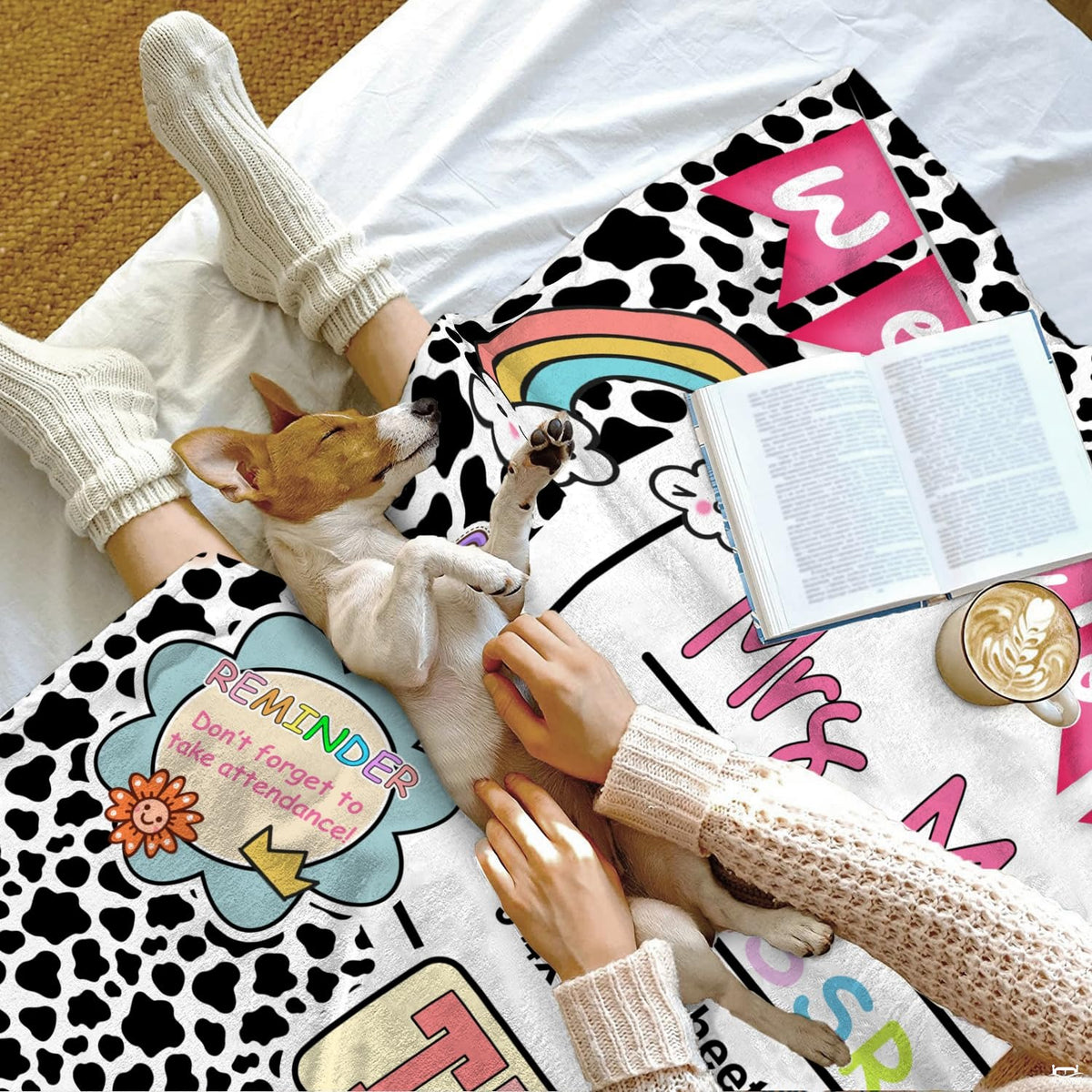 Lifestyle setting displaying the educator throw blanket neatly folded on an armchair.
