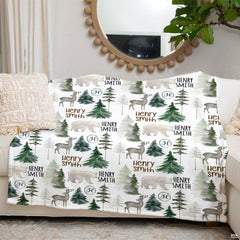 Side perspective showing peaceful woodland greenery and deer designs on forest nursery bedding.