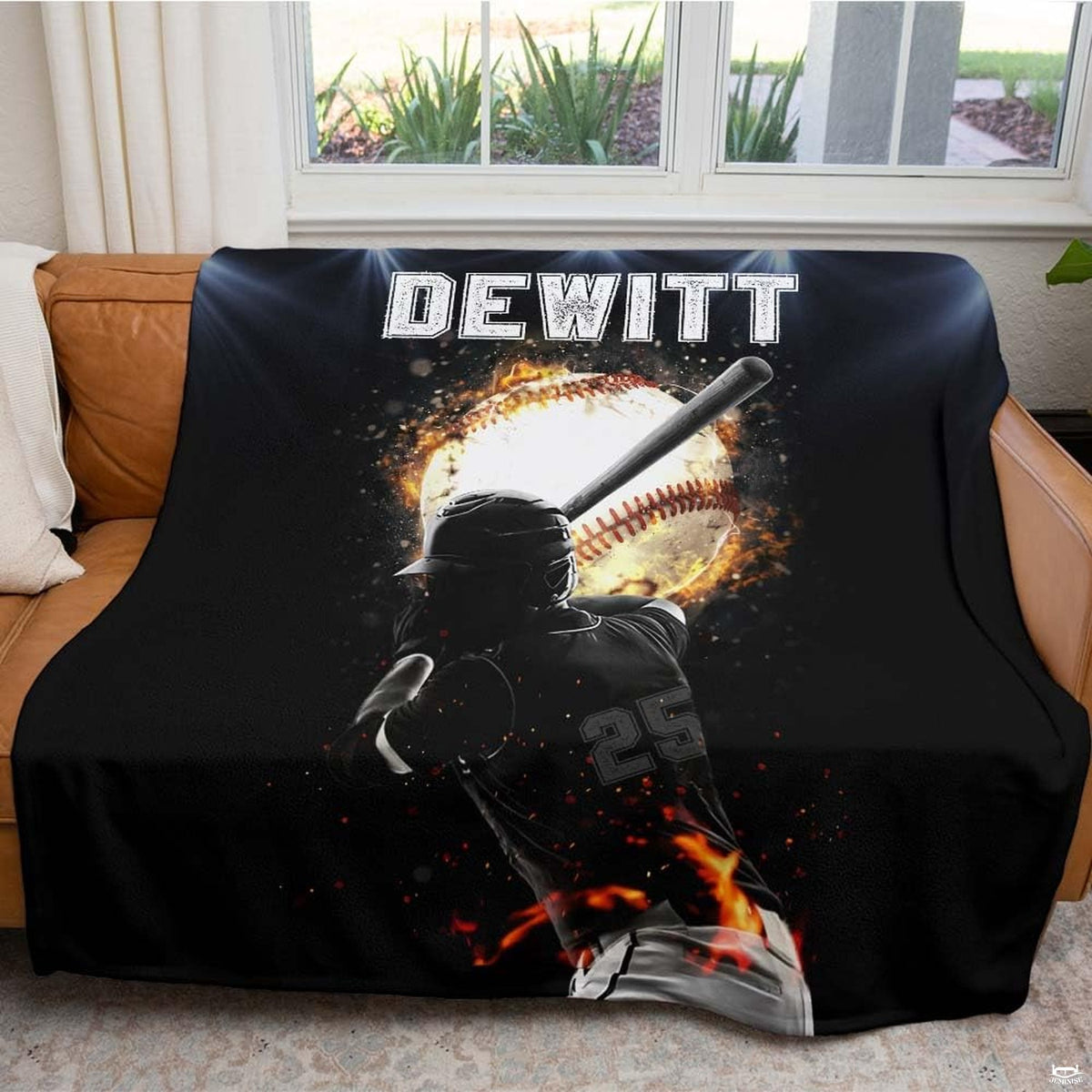 Close up view of the fiery baseball graphic with glowing embers and vibrant orange flame details.