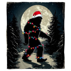 Bigfoot in a Santa hat wrapped in colorful Christmas lights under a full moon, view 2.