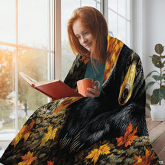 Fall foliage black bear throw blanket draped across living room sofa