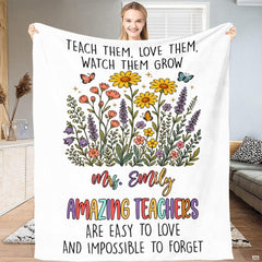 Teacher appreciation wildflower throw blanket view 2 styled on living room sofa in bright modern home