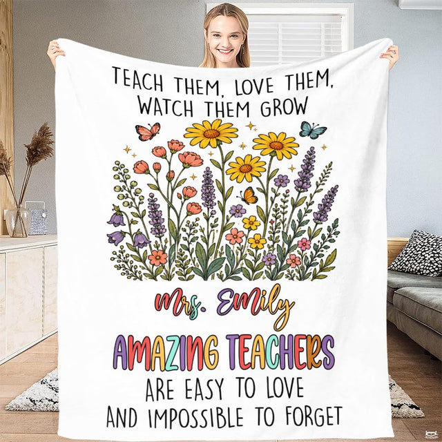 Teacher appreciation wildflower throw blanket view 2 styled on living room sofa in bright modern home