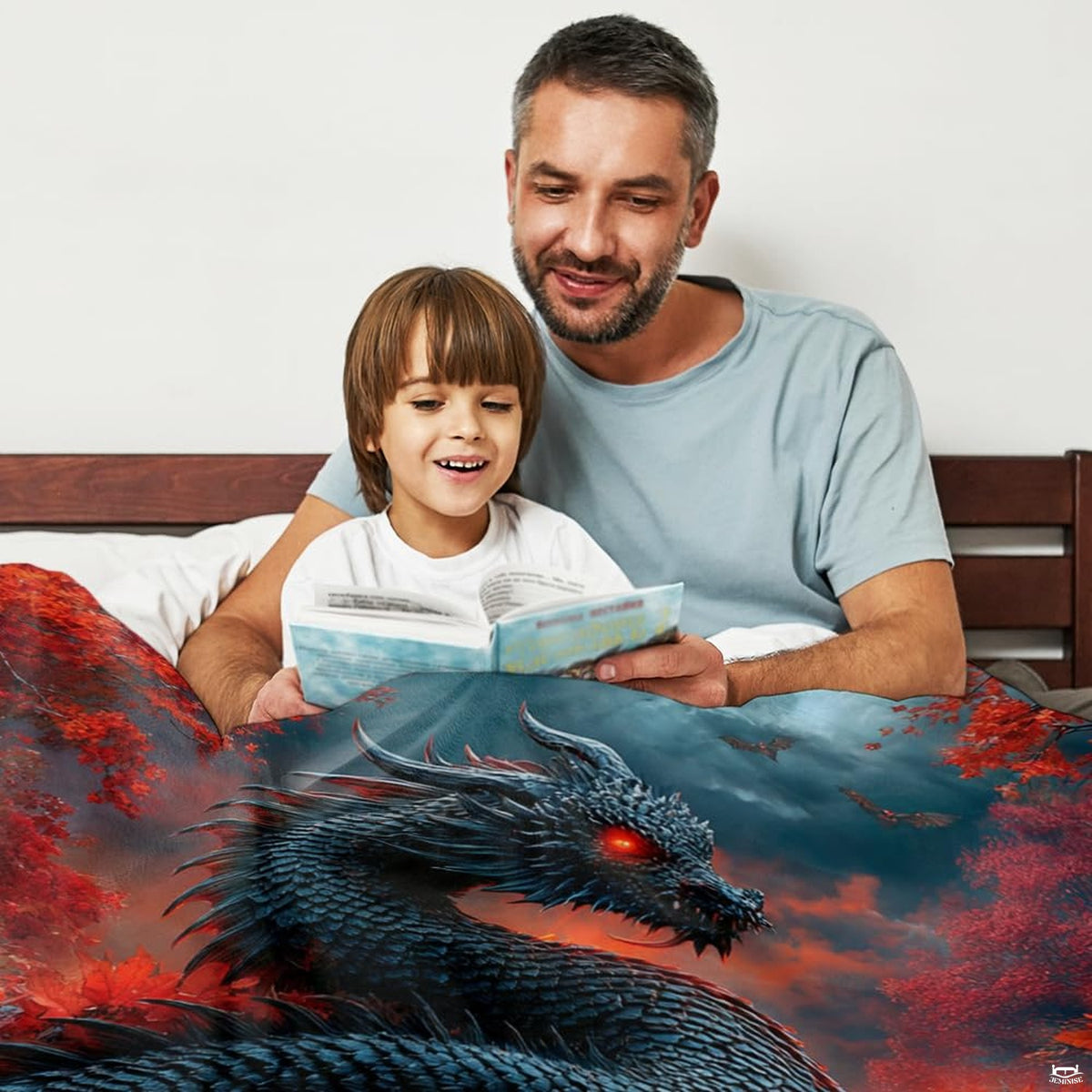 Close-up perspective of black dragon head and glowing pumpkin on throw blanket