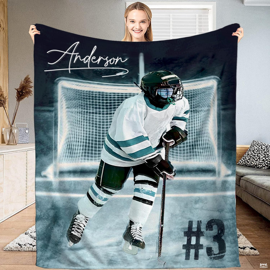 Youth ice hockey skater at goal net graphic blanket held upright