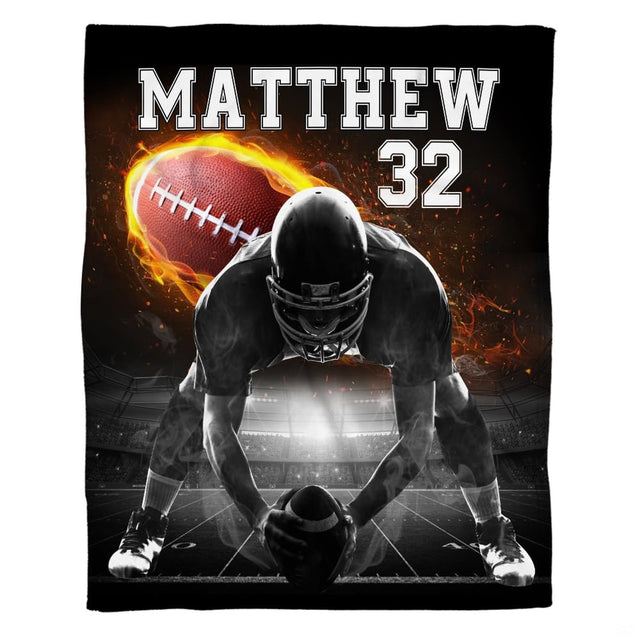 Football lineman throw blanket view 2 highlighting offensive center stance, flaming football, and stadium lights