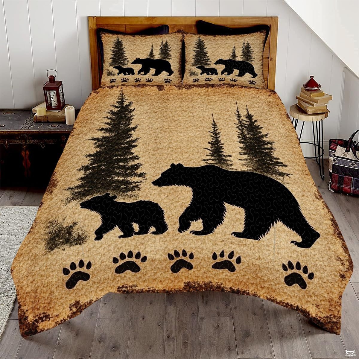 Rustic cabin bed cover showing mother bear and cub silhouettes amid pine trees on vintage tan paper background.
