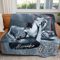Close up shot showing fine graphic details and white underside of ice hockey blanket.