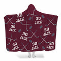 Ice hockey bedding set pattern showing crossed sticks and pucks on maroon burgundy background.