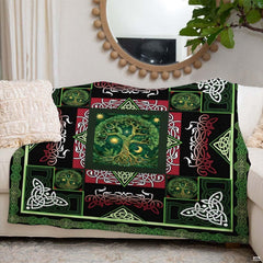 Bedding styled in an ambient bedroom setting accentuating dark paneled framing and mythic artwork.
