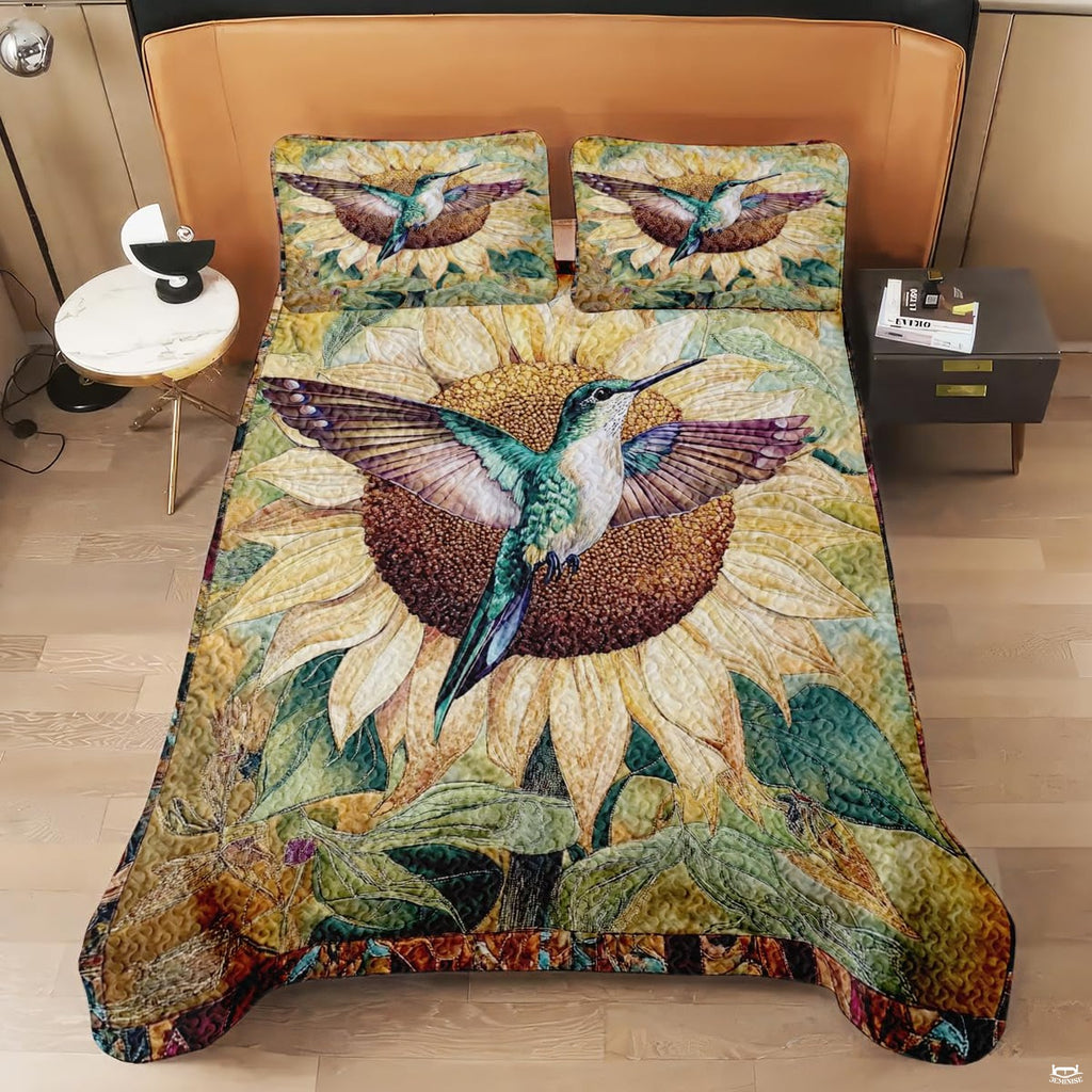 Overhead view of hummingbird and cream sunflower artwork