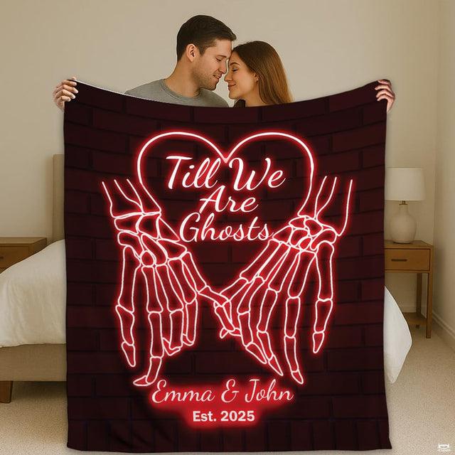 Gothic couple blanket held up in bedroom displaying red neon skeleton hands pinky promise design