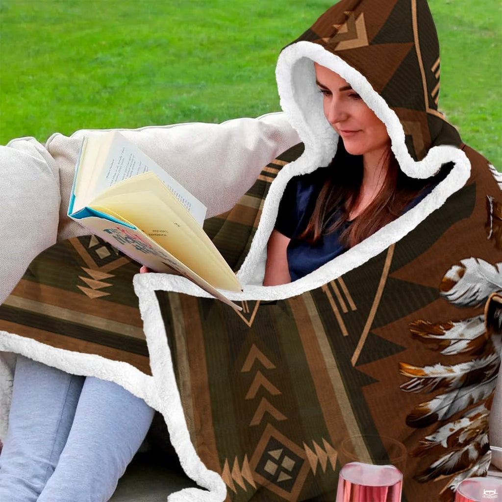 Overhead presentation of earth tone wolf geometric blanket