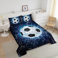 Close-up view of soccer bedding showcasing athletic cleats, soccer ball graphics, and blue tones