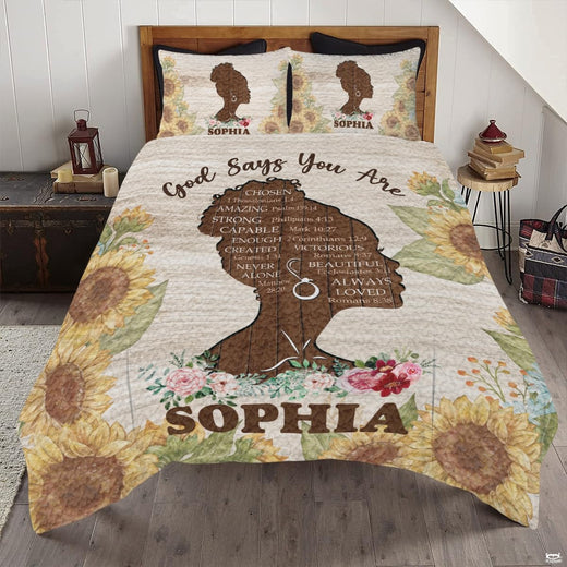 Blush bedding set showcasing watercolor floral wreaths and inspirational Christian verses in a pastel bedroom.