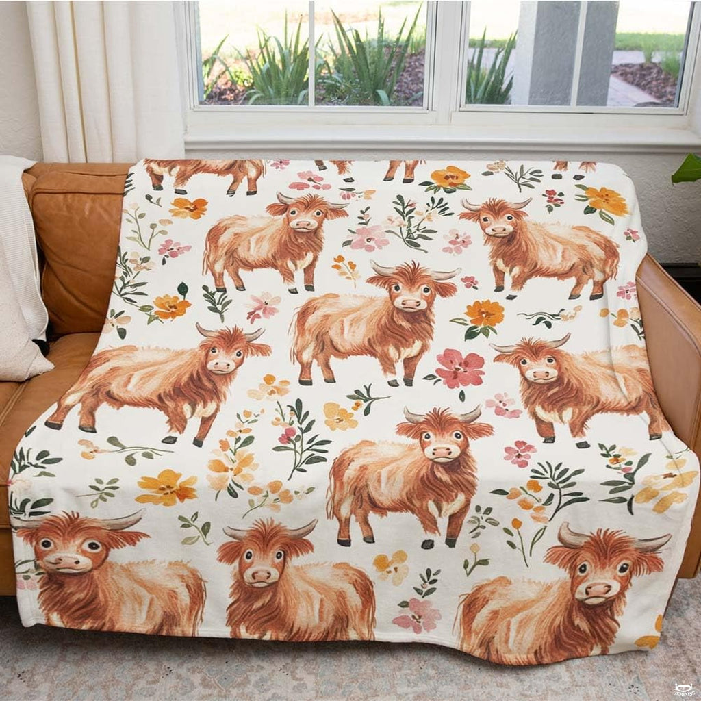 Farmhouse styled bedroom presentation showcasing charming highland cow botanical bedding.