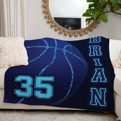 Neon light blue basketball seam arcs against navy backdrop on sports theme bedroom bedding.