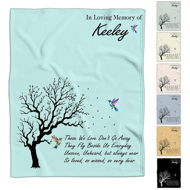 Winter tree silhouette print with colorful watercolor hummingbirds over a pastel background.