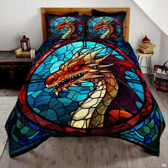 Orange dragon stained glass artwork displayed across a turquoise bed covering and matching shams