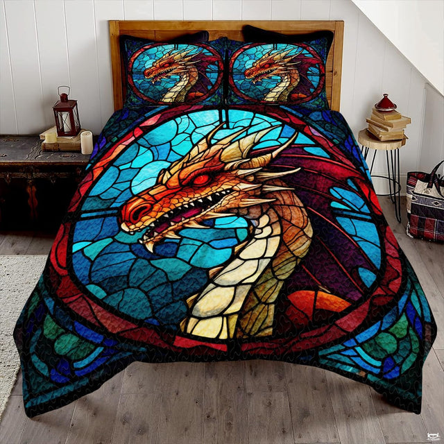 Orange dragon stained glass artwork displayed across a turquoise bed covering and matching shams
