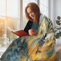 Living room sofa display showing the celestial wolf pair and river throw blanket draped over furniture.