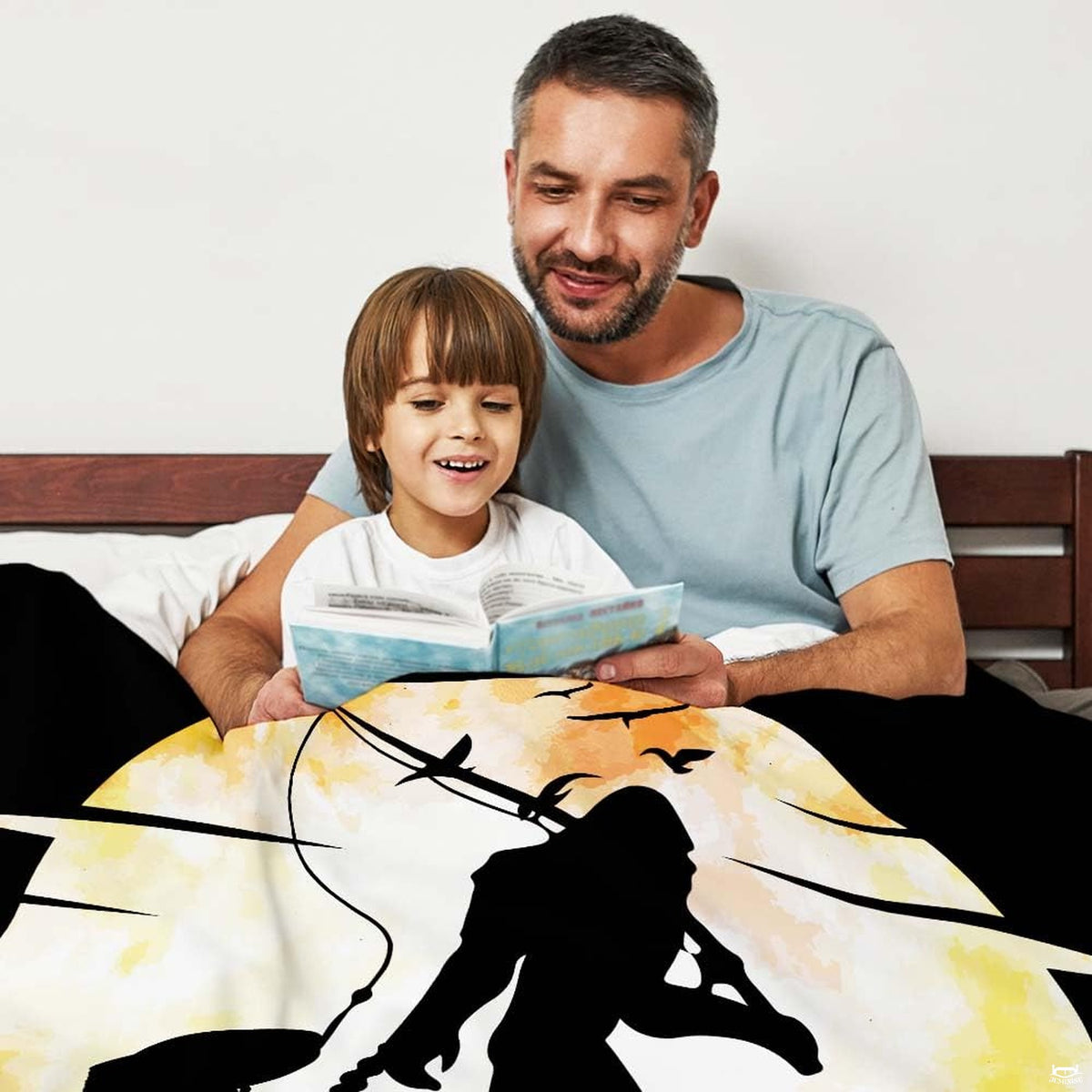 Fishing Bigfoot moon silhouette throw blanket view 2 styled on living room couch in rustic lodge home